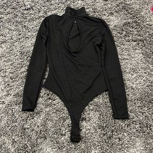 PLT NWT black keyhole bodysuit. Size 6.